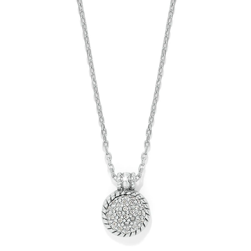 Silver necklace with a round pendant on a white background