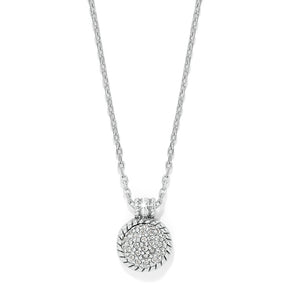 Silver necklace with a round pendant on a white background