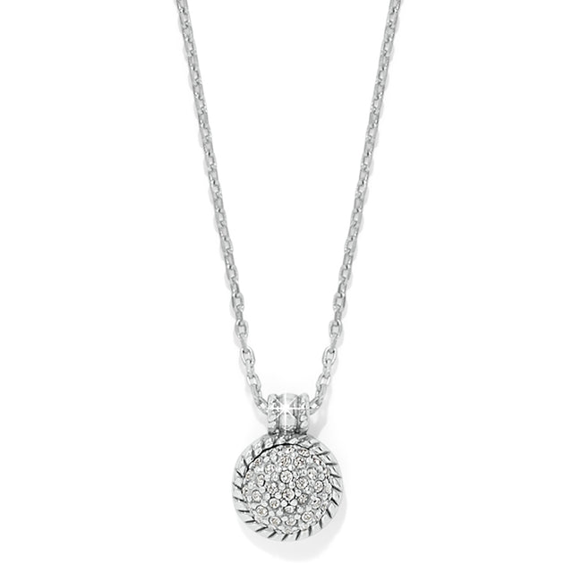 Silver necklace with a round pendant on a white background