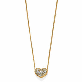Gold necklace with a heart-shaped pendant on a white background