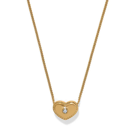 Gold heart-shaped necklace with a diamond on a white background