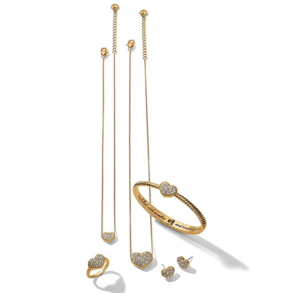 Gold jewelry set including necklace, bracelet, ring, and earrings on a white background