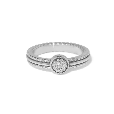 A silver-toned double-band ring with a textured twisted band and a round pavé-set clear gemstone center, shown on a plain white background.