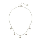 Silver necklace with diamond pendants on a white background