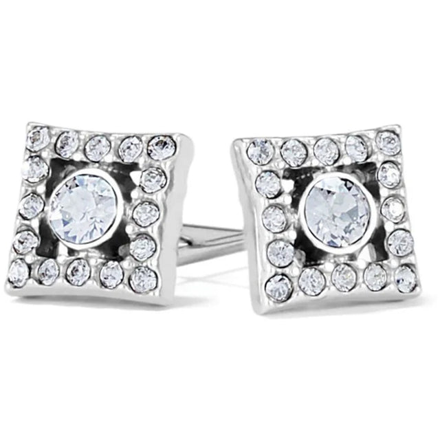Pair of silver square earrings with clear gemstones on a white background