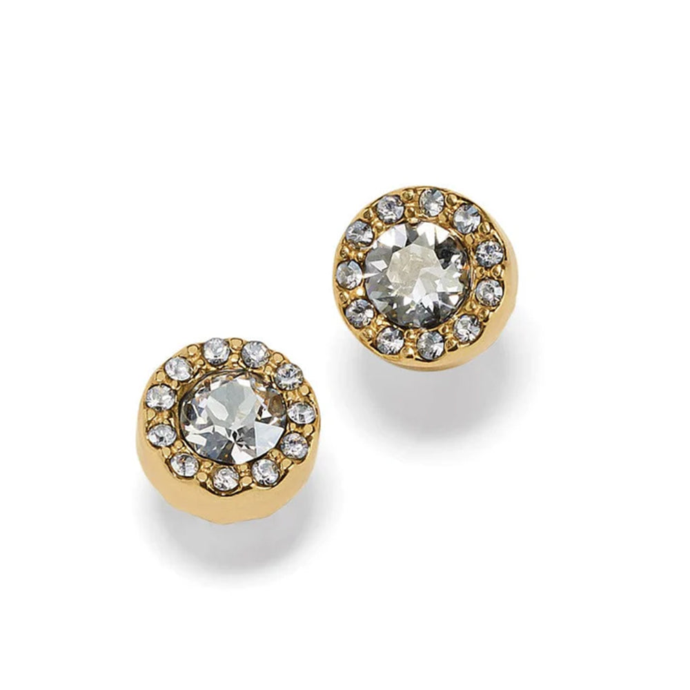 Gold earrings with clear gemstones on a white background