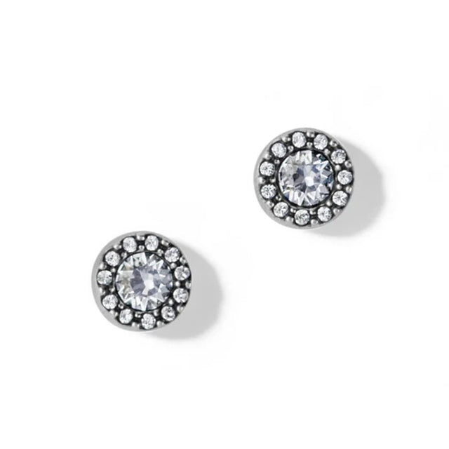 Pair of round stud earrings with clear gemstones on a white background