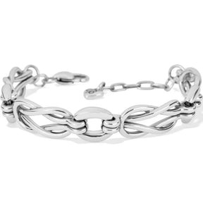 Silver bracelet with interlocking links on a white background