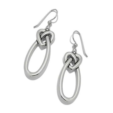 Silver knot earrings on a white background