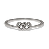 A polished silver ring featuring a central interlocking double heart design, shown on a clean white background.