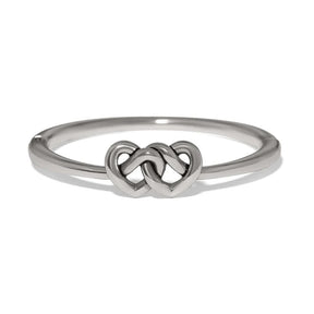 A polished silver ring featuring a central interlocking double heart design, shown on a clean white background.