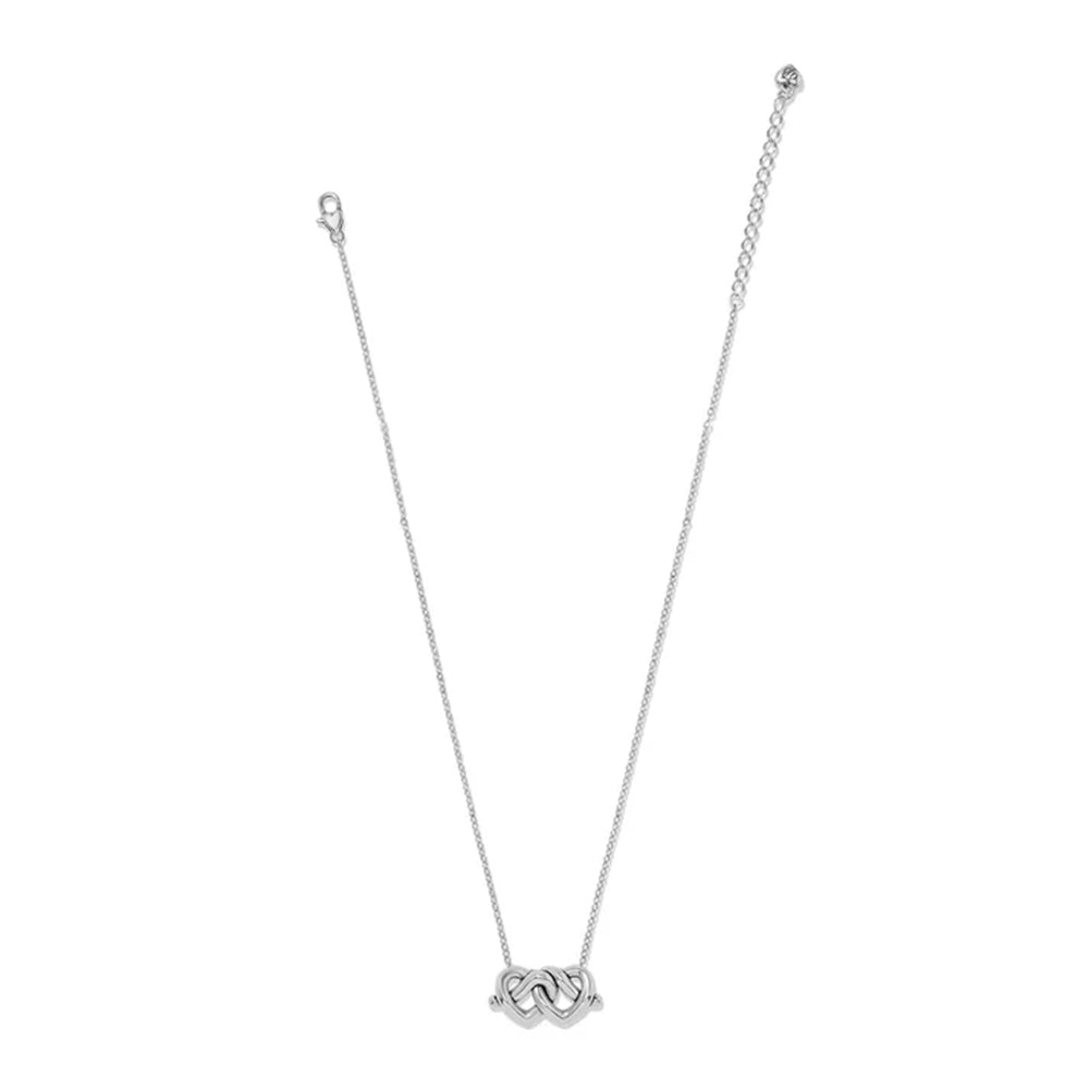 A silver chain necklace with a small three interlocking ring pendant, displayed against a solid white background.
