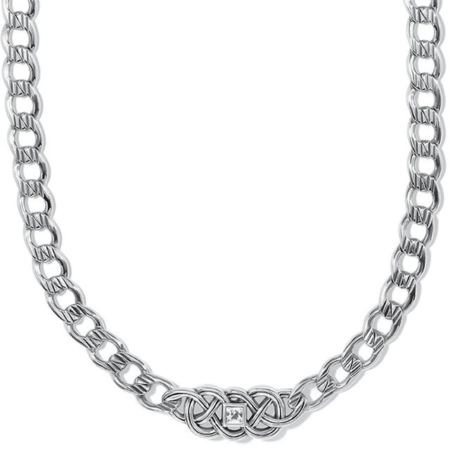 Silver chain necklace with a diamond clasp on a white background