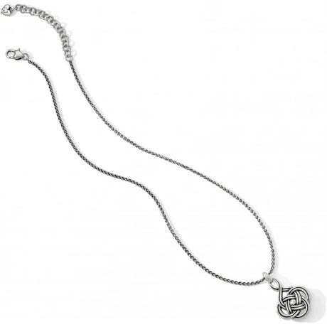 Silver necklace with a intricate pendant on a white background