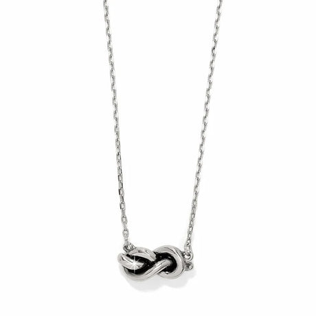Silver necklace with a unique pendant on a white background