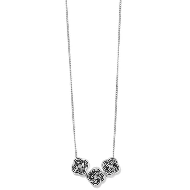 Necklace with interlocking heart pendants on a white background