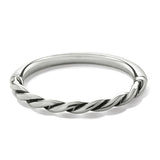 Silver twisted ring on a white background