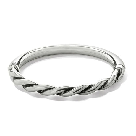 Silver twisted ring on a white background