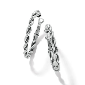 Pair of silver hoop earrings on a white background