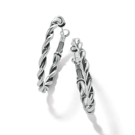 Pair of silver hoop earrings on a white background