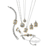 Collection of silver and gold jewelry including necklaces, pendants, and a bracelet on a white background.