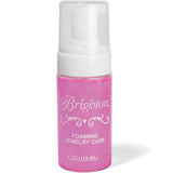 Pink bottle of Brighton foaming jewelry care on a white background