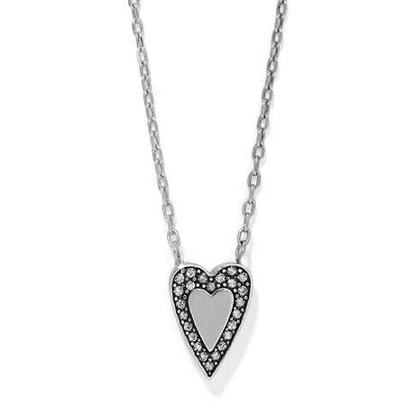 Heart-shaped pendant necklace with clear stones on a white background