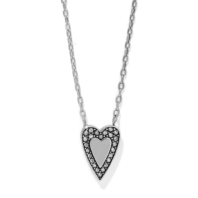 Heart-shaped pendant necklace with clear stones on a white background