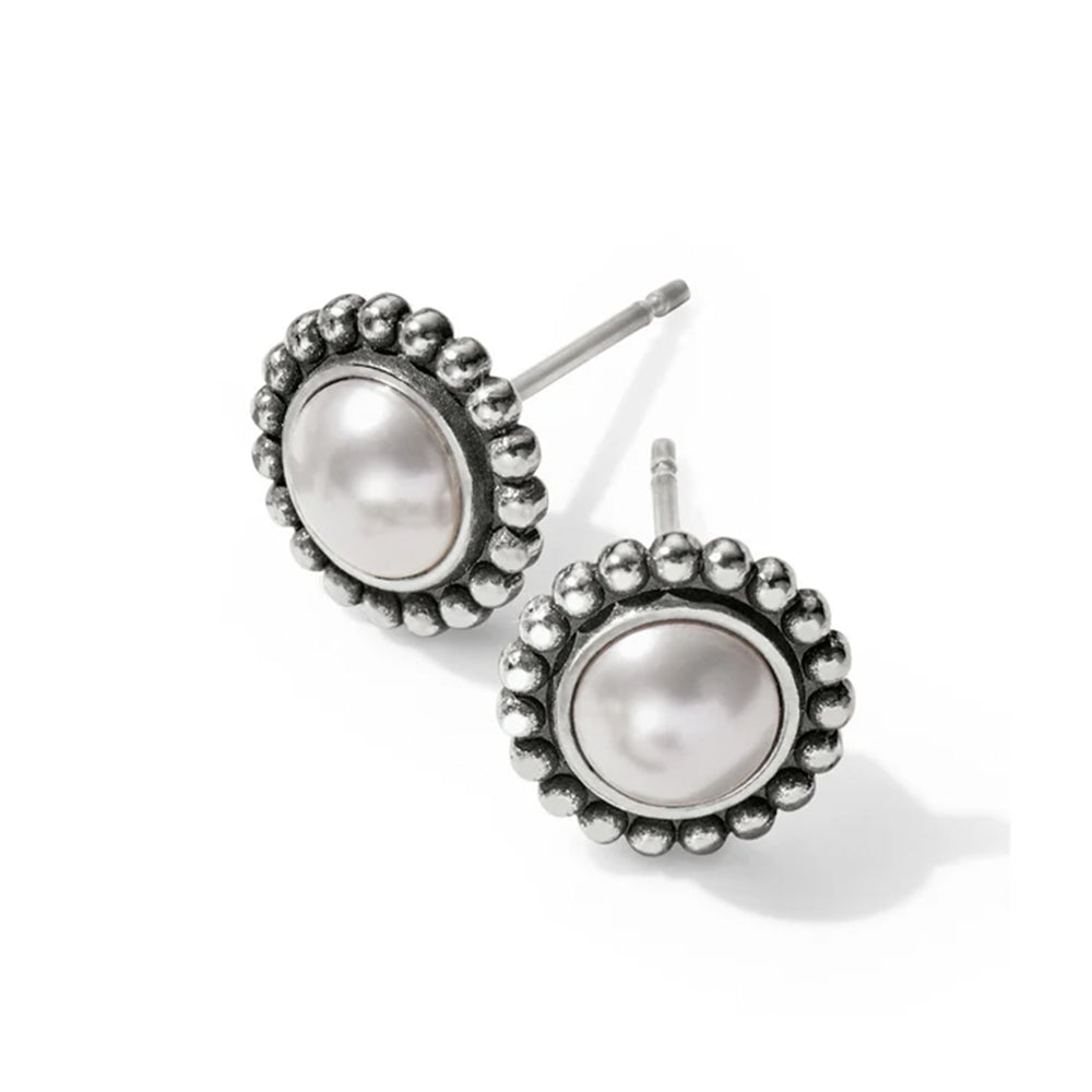Pair of pearl earrings with silver detailing on a white background