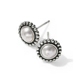 Pair of pearl earrings with silver detailing on a white background