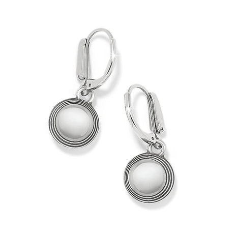 Pair of silver earrings with round white stones on a white background