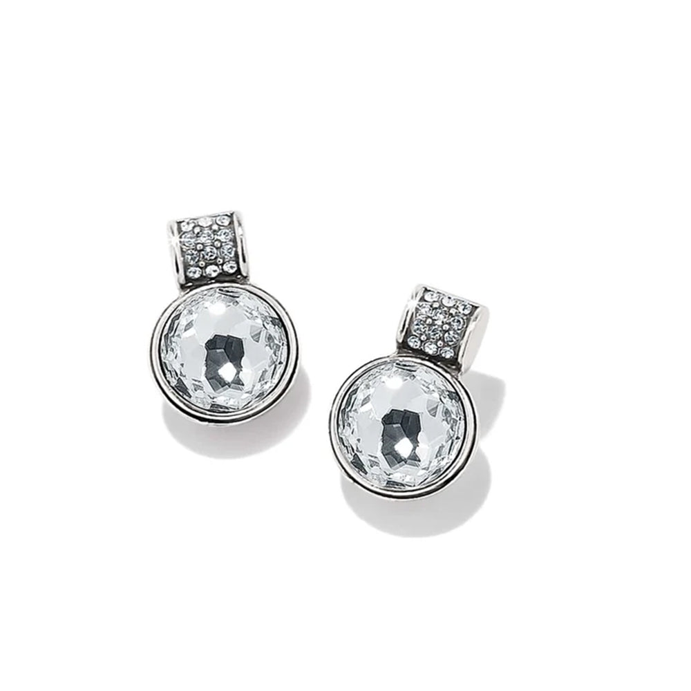 A pair of silver-toned drop earrings featuring a large round clear faceted gemstone in a bezel setting, with a smaller pavé-set round gemstone above it, shown on a white background with soft shadows.