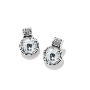 A pair of silver-toned drop earrings featuring a large round clear faceted gemstone in a bezel setting, with a smaller pavé-set round gemstone above it, shown on a white background with soft shadows.