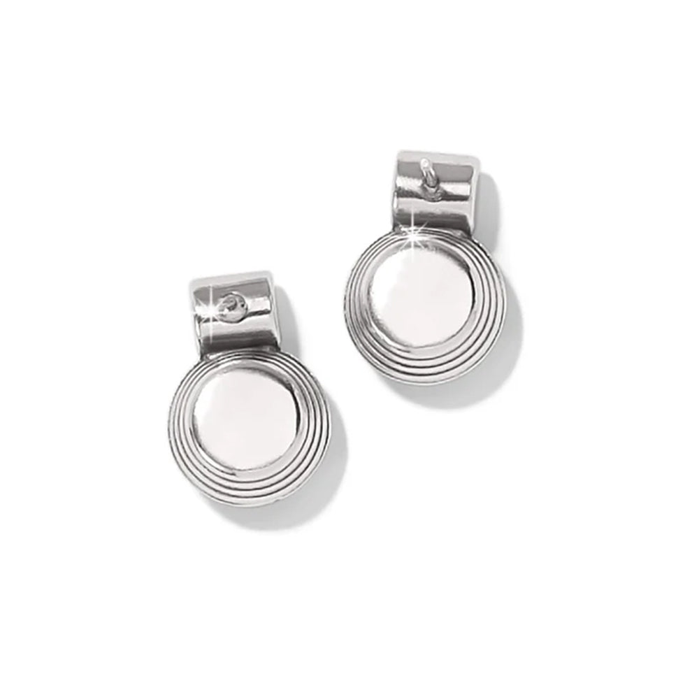 Pair of silver earrings with circular designs on a white background