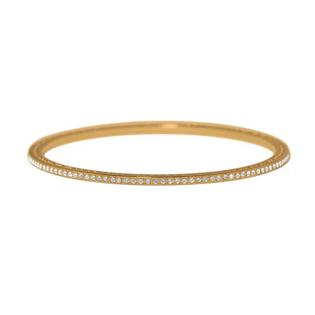 A thin gold bangle bracelet with a single row of small clear stones along the front edge, shown against a plain white background.