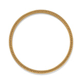 Gold bangle with intricate design on a white background
