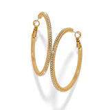 A pair of gold hoop earrings embellished with clear rhinestones, displayed on a clean white background with soft shadows.