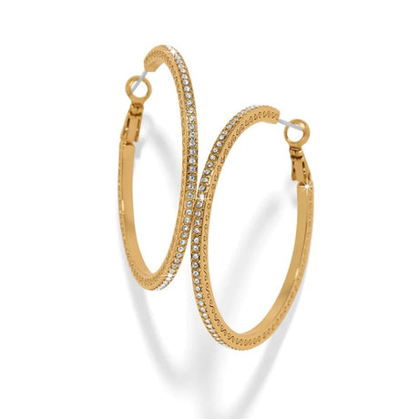 A pair of gold hoop earrings embellished with clear rhinestones, displayed on a clean white background with soft shadows.