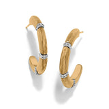 Gold hoop earrings with embedded diamonds on a white background