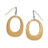 Gold oval earrings with silver hooks on a white background