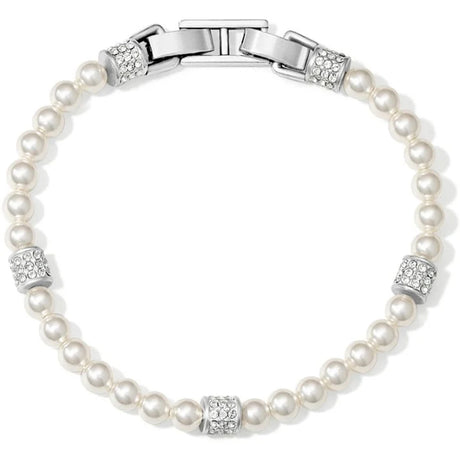 A pearl bracelet with a silver-toned clasp and decorative crystal-encrusted spacer beads, shown on a plain white background.