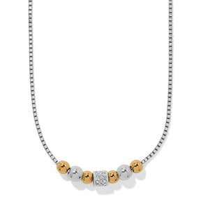 Necklace with gold and silver beads on a white background