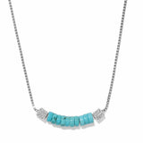 A silver box chain necklace featuring a curved bar of turquoise-colored beads in the center, flanked by two square silver bezel-set crystal accents, shown on a plain white background.