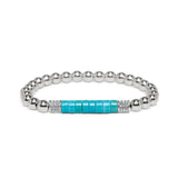A silver beaded bracelet with a central turquoise blue rectangular inlay and small clear crystal accents on either side, shown on a plain white background.