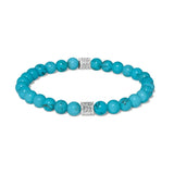 A turquoise beaded stretch bracelet with two silver square charms set with small clear stones, displayed on a clean white background.