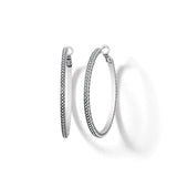 Pair of silver hoop earrings on a white background