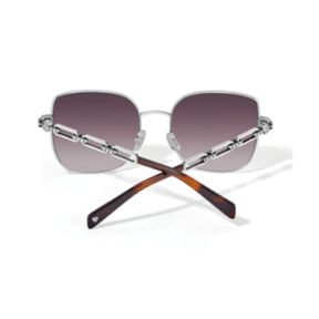 Sunglasses with gradient lenses and tortoiseshell arms on a white background