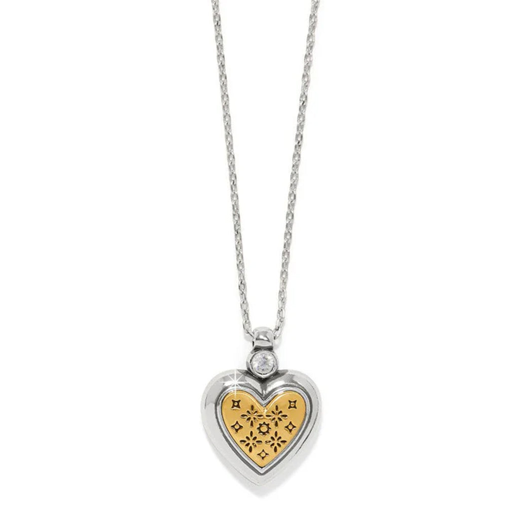 Heart-shaped pendant necklace with gold and silver design on a white background