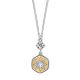 Necklace with a gold and silver pendant on a white background