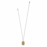 A silver-toned chain necklace with a rectangular pendant featuring a gold-toned textured background and a central clear gemstone, displayed on a solid white background.